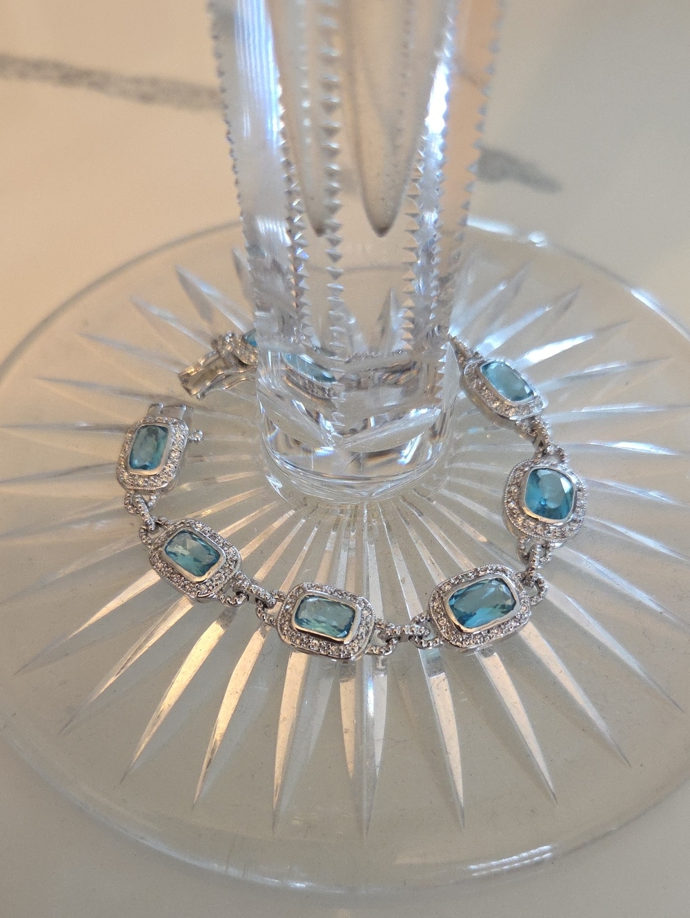 Sterling Silver Blue Topaz Halo Bracelet - Elegant Women’s Jewelry